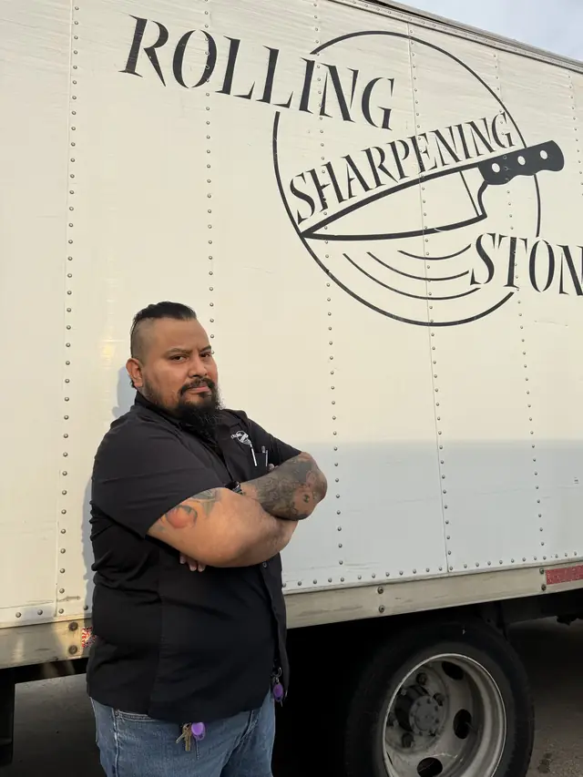 Alberto, manager at Rolling Sharpening Stone, at a Dallas sharpening truck