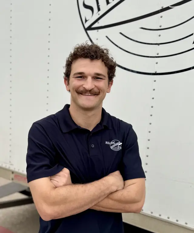 J. Reilly Kight, owner of Rolling Sharpening Stone, at a sharpening truck